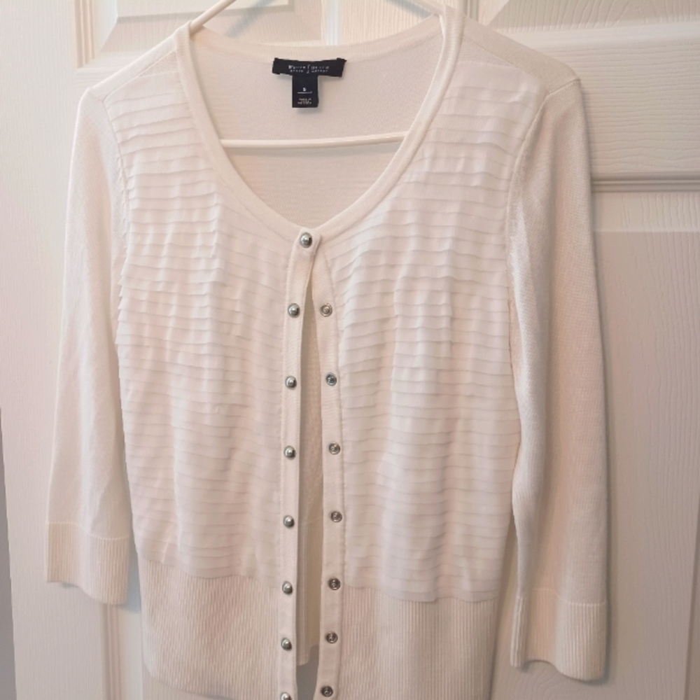 White cardigan in brand new condition.  Nice ribbon front and plain back.